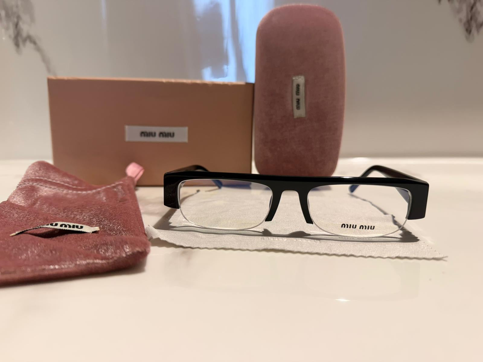 OCCHIALI MIU MIU