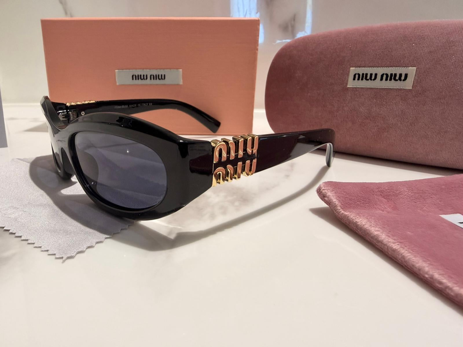 OCCHIALI MIU MIU